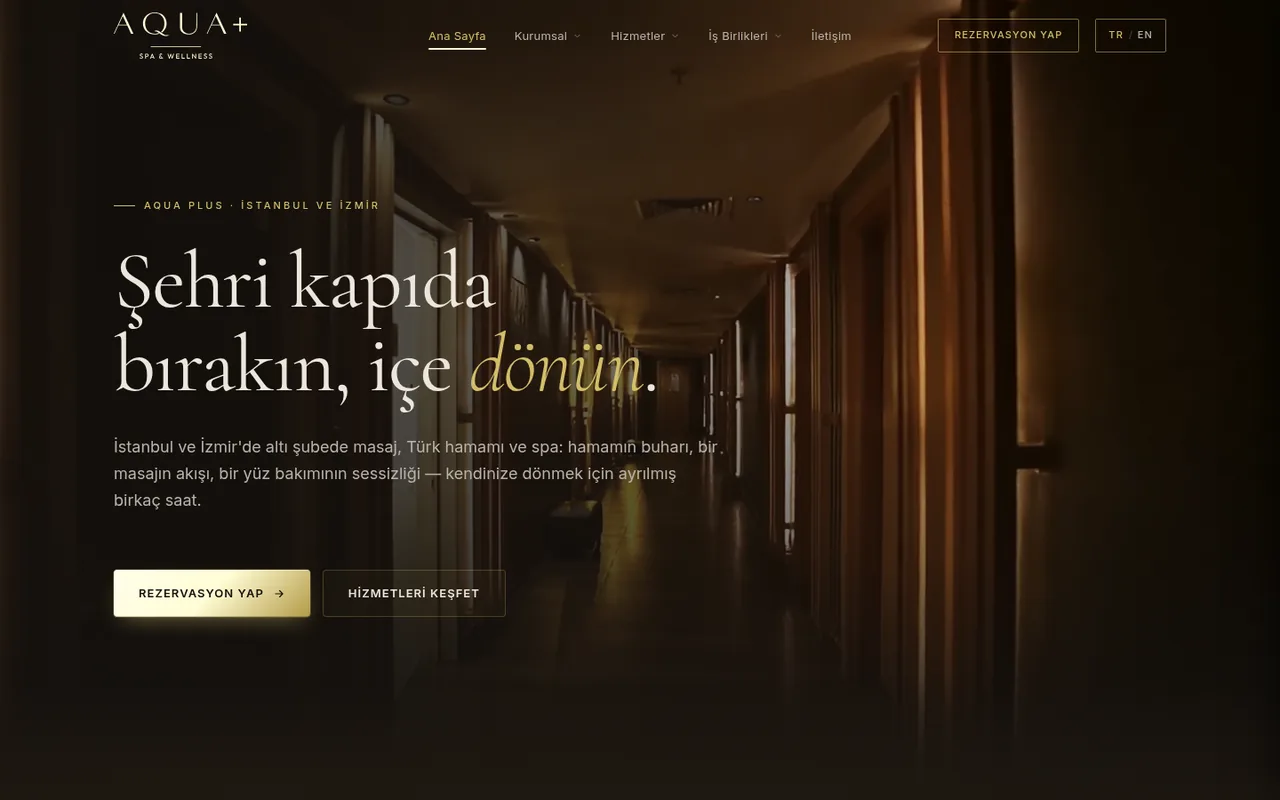 Opening screen of the Aqua Plus Spa Exclusive website: booking and explore services buttons, with a TR and EN language switch at the top right